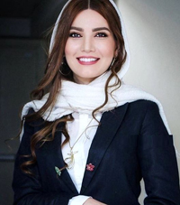 A young muslim woman wearing a purple scarf
